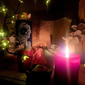 Elegant Red Candle with Floral Design